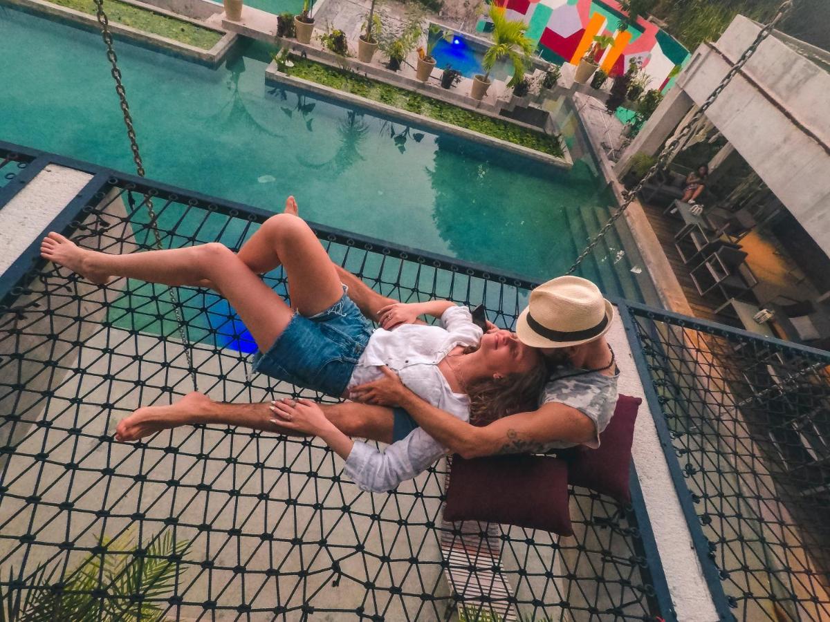 Hotel Makaaba Eco-Boutique Бакалар Екстер'єр фото A couple on a hammock